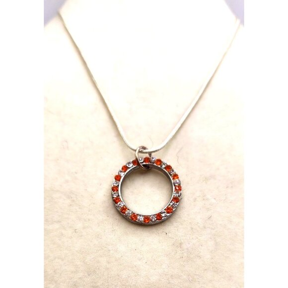 Silver Tone Hollow Crcle Pendant Necklace With Orange & Colorless Crystals - Picture 3 of 3